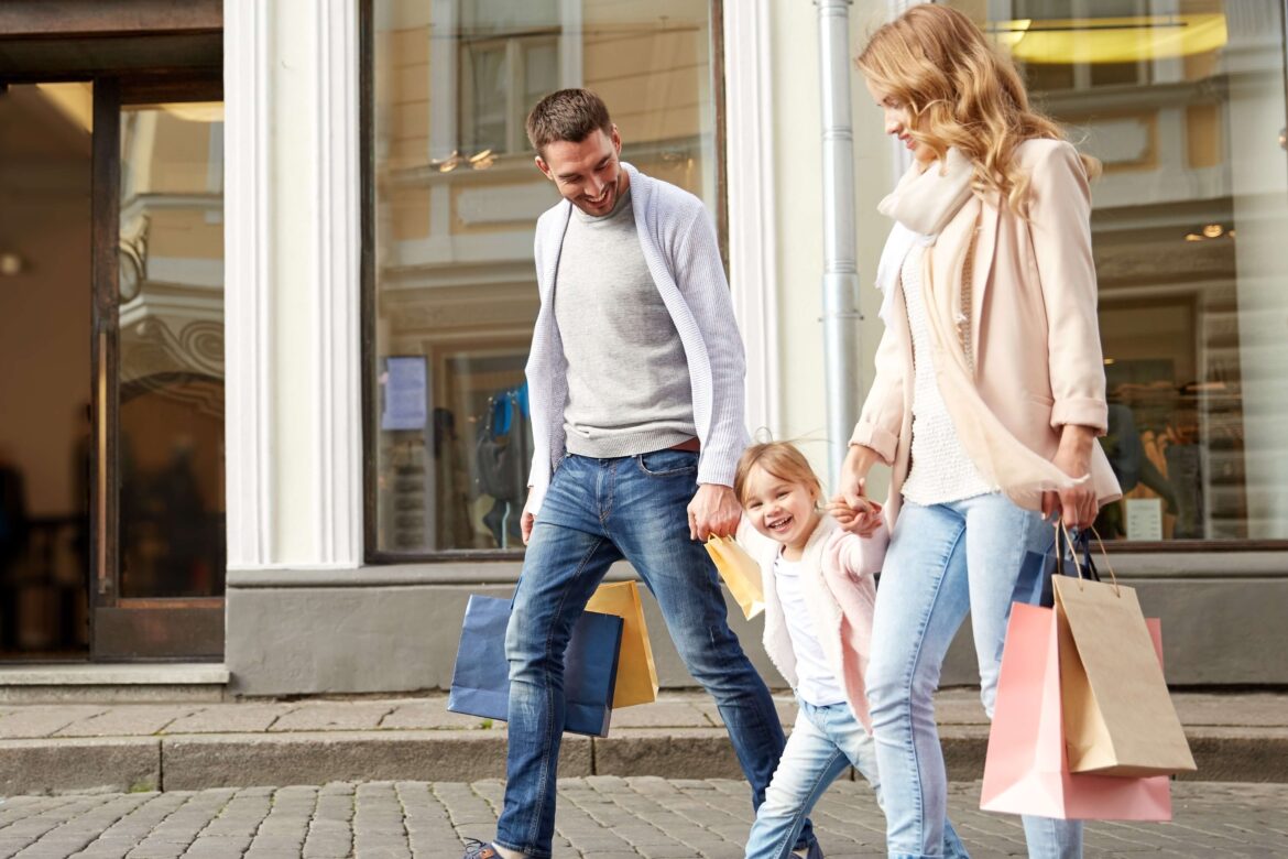 A family of three looking at Shops In Walker MN.