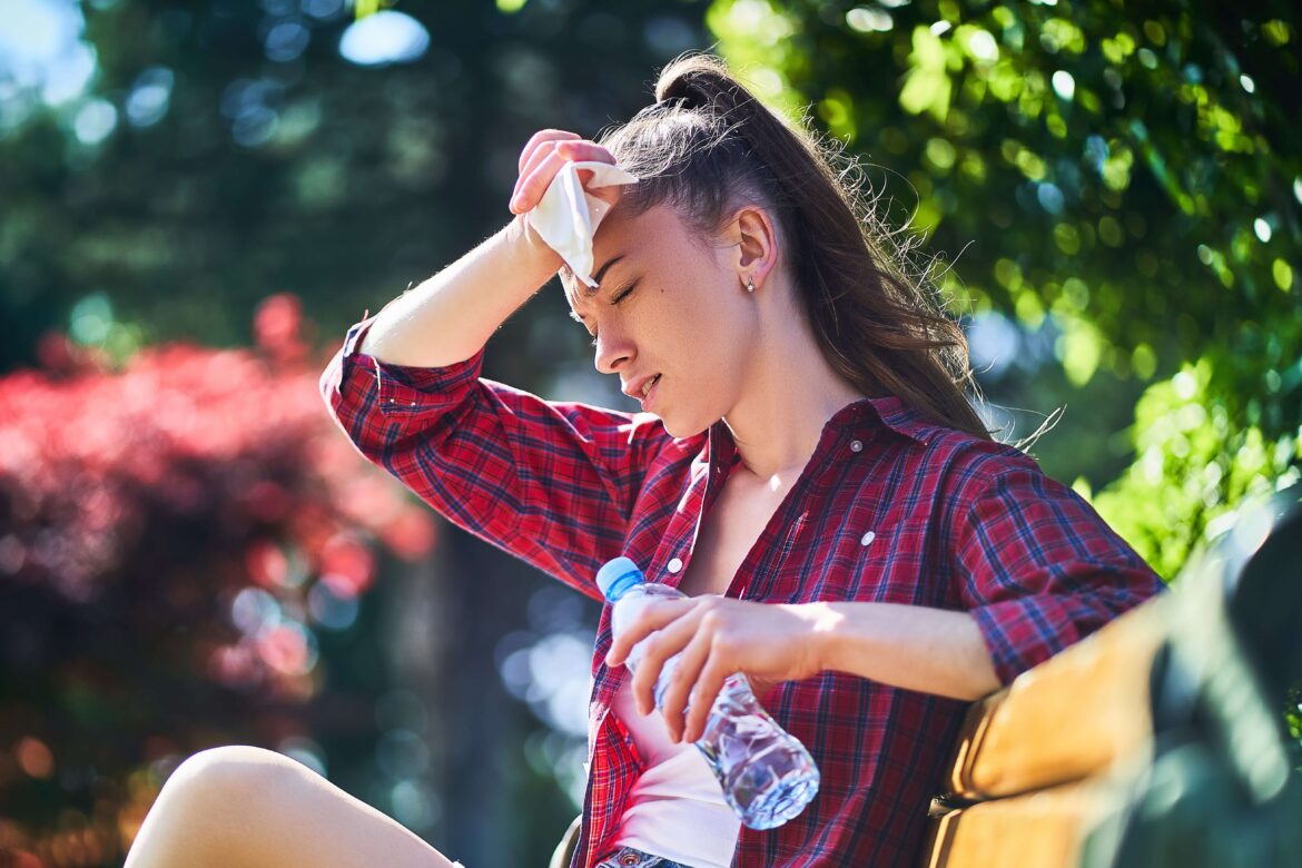 A woman sweating during a Minnesota Summer.