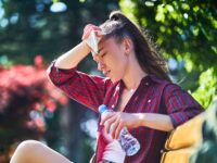 A woman sweating during a Minnesota Summer.